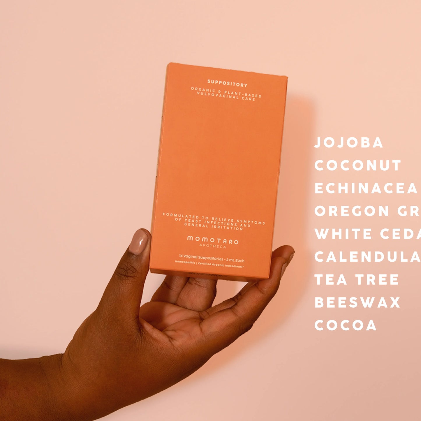 Hand holding Momotaro Apotheca's Suppository